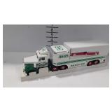 Hess gasoline toy truck and helicopter