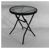 Floral glass-top patio table, folding, 16" × 8"