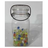 Ball ideal Mason jar with glass lid and some