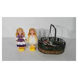 Basket with two magnetic dress up dolls and