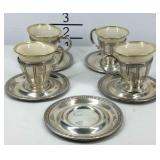 Sterling silver cups with saucers, five Sterling