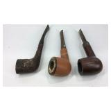 Three smoking pipes