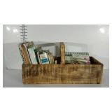 Primitive wood basket full of cookbooks and dvds