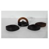 Four cast irons, one includes wooden handle