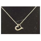 10k white gold heart pendant (missing one stone)