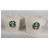Two Starbucks coffee mugs