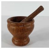 Wooden mortar and pestle, use wear as shown