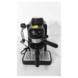 Krups espresso maker, powers up