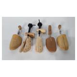 Five wooden shoe stretchers