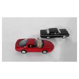 Two cars, 1964 Chevrolet and Pontiac firebird