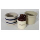 Stoneware, two crocks and syrup jug, crocks
