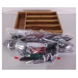 Drawer divider with stainless flatware, different