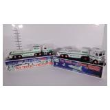 Two Hess trucks missing vehicles, 1995 and 1999,