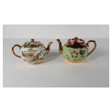 Two painted gold trimmed teapots, made in England
