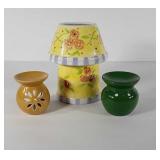 Three ceramic warmers