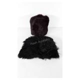 Two fur muffs, black and brown