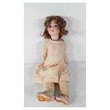 Doll with fully jointed composition body, 23"