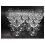 Clear glass stemmed glasses, sixteen