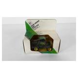 ERTL John Deere four-wheel drive model tractor,
