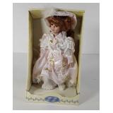 Porcelain doll in packaging