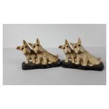 Dog shaped bookends by Thanhardt Burger Corp,