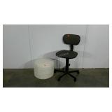 White vinyl ottoman and a simple office chair