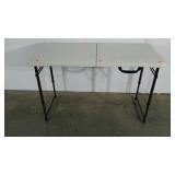 Four foot folding table, adjustable legs