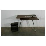 Folding sewing table and a paper shredder-works