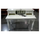 Desk with attached outlet, wear as shown