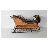 Holiday decor, wicker and wrought iron sleigh,