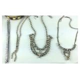 Costume jewelry, stretch bracelet, silvertone