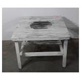 Wooden patio table with hole in center,