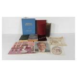 Books, savings stamps catalogs, picture of Van