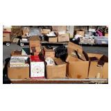 Skid with books, VHS tapes, VHS recorder,