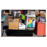 Skid with suitcase, Shop-Vac, tripod, helium tank