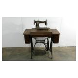 Singer sewing machine and table, finish wear as
