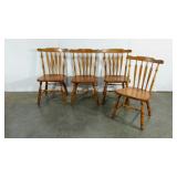 Four arrow back dining chairs