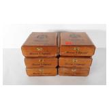 Six Hemingway wooden cigar boxes