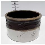 Stoneware crock with grape vine pattern, chipped