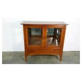 Thomasville media stand, one adjustable glass