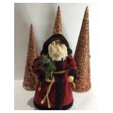 Christmas decor, three trees and a Santa