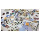 Gallon bag of loose stamps