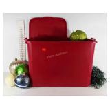 Tote full of oversized holiday ornaments,  some