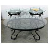 Two glass topped end tables, ornate metal bases,
