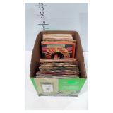 Box of vinyl records, all 45rpm, includes desert