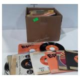 Box of 45 RPM vinyl records, includes Charlie