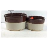 Two brown over white crocks, one is marked R.R.P.