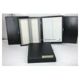 Four microscope slide boxes