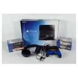 Sony PS4 game system with headphones, extra