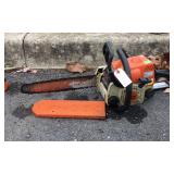 Stihl MS180c Chainsaw with bar cover, running